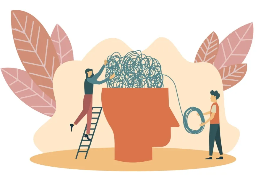 Imagen de una cabeza de la que sale una maraña de hilos y dos personas intentan organizarlo. En qué casos funciona la terapia cognitivo-conductual